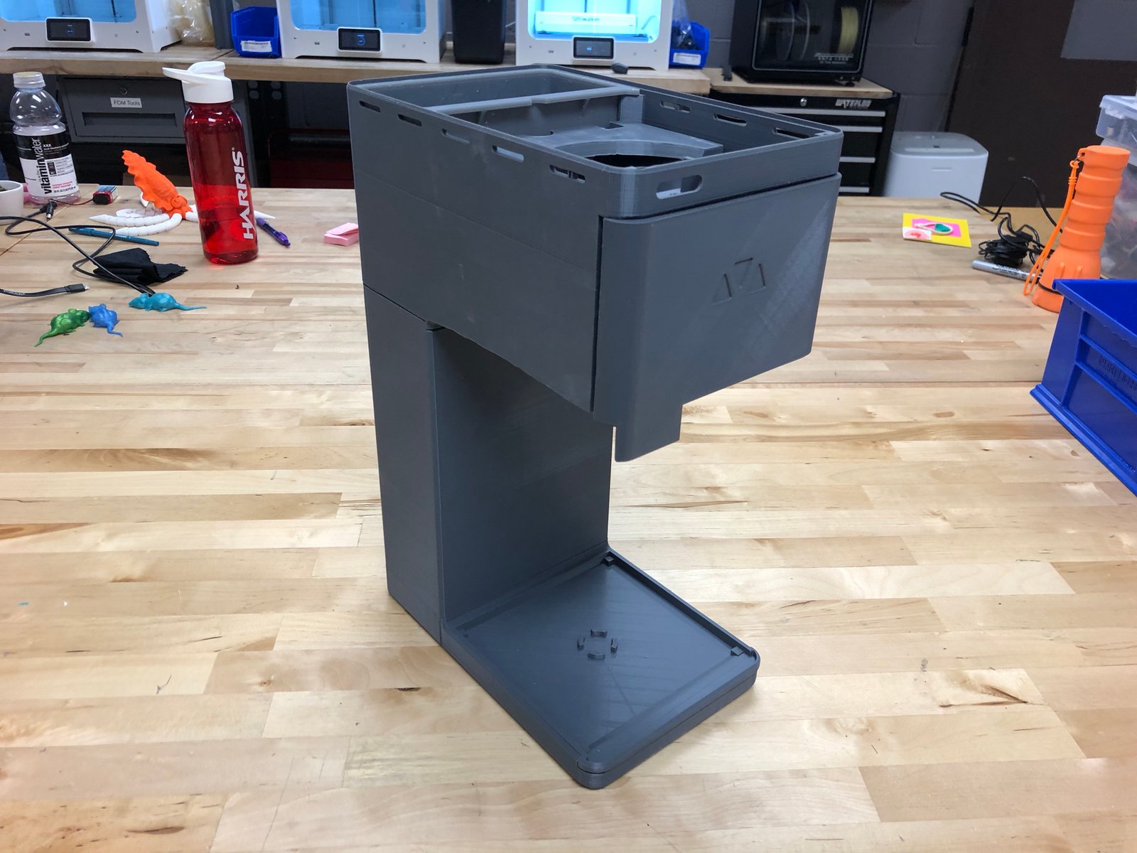  One of the first 3D printed prototyes, used for testing interfacining tolcerances. A combination of FDM, SLA and SLS—both plastic and metallic—is to be used for the final design, resulting in dozens of test builds to check for play and fitment. 